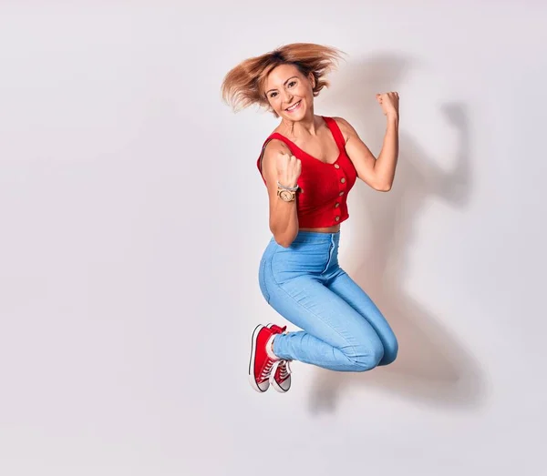 Young Beautiful Woman Wearing Casual Clothes Smiling Happy Jumping Smile — Stock Photo, Image