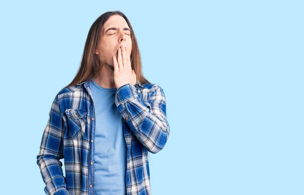 Young Adult Man Long Hair Wearing Casual Shirt Bored Yawning — Stock Photo, Image