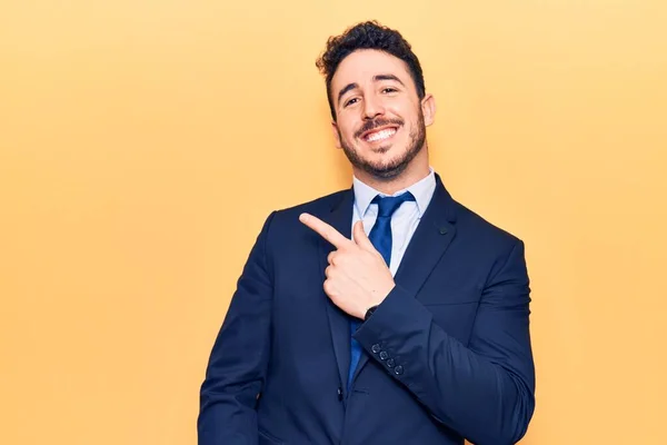 Young Hispanic Man Wearing Suit Cheerful Smile Face Pointing Hand — Stock Photo, Image