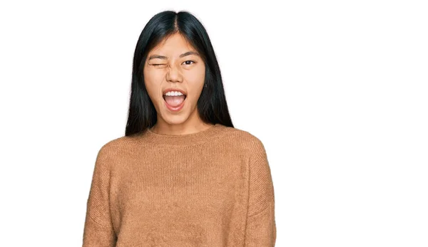 Beautiful Young Asian Woman Wearing Casual Winter Sweater Winking Looking — Stock Photo, Image