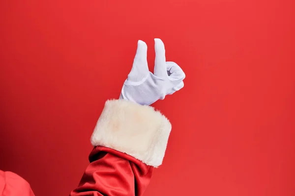Main Homme Portant Costume Santa Claus Gants Sur Fond Rouge — Photo