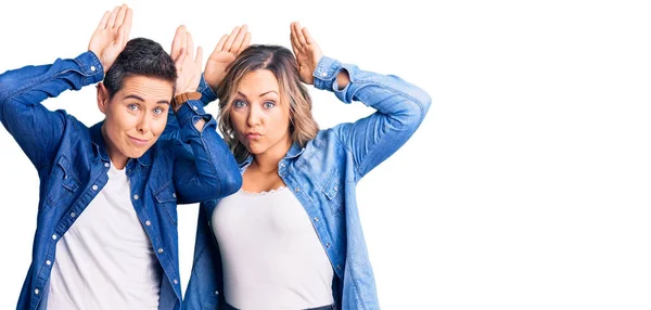 Couple Women Wearing Casual Clothes Doing Bunny Ears Gesture Hands — Stock Photo, Image