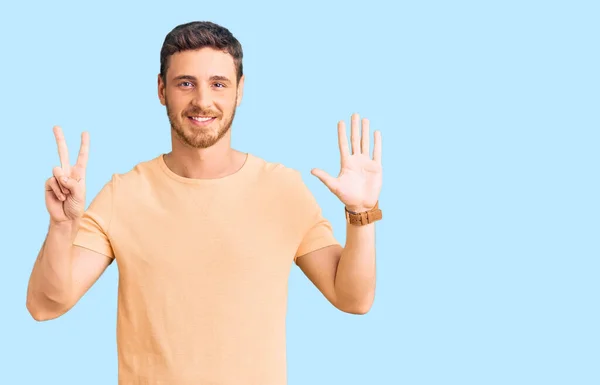 Handsome Young Man Bear Wearing Casual Yellow Tshirt Showing Pointing — 图库照片