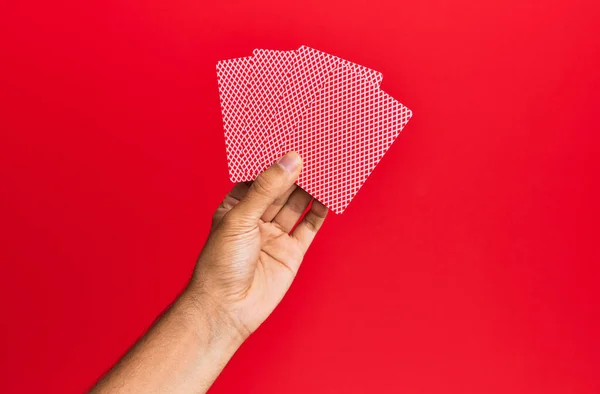 Hand Hispanic Man Holding Poker Cards Isolated Red Background — Stock Photo, Image