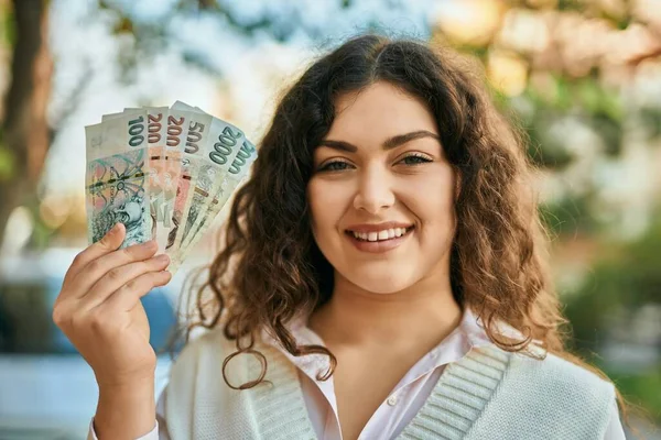 Young Hispanic Woman Smiling Happy Holding Czech Koruna Banknotes City — Stock Photo, Image