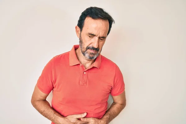Homem Hispânico Meia Idade Vestindo Roupas Casuais Com Mão Estômago — Fotografia de Stock