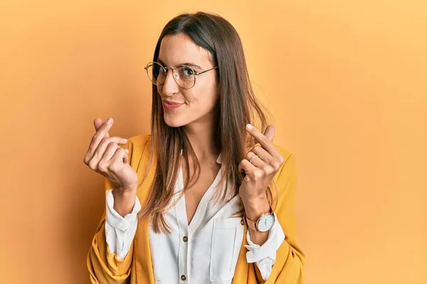 Young Beautiful Woman Wearing Business Style Glasses Doing Money Gesture — Stock Photo, Image