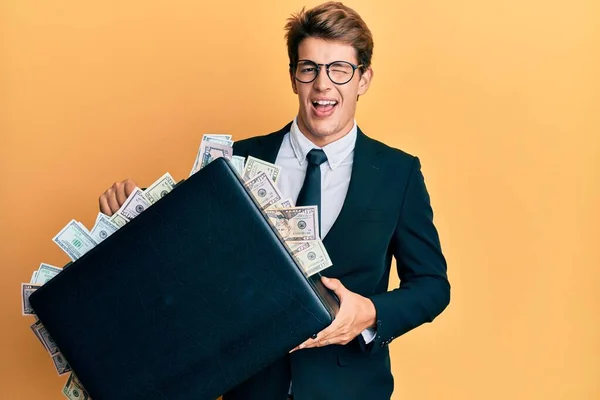 Handsome Caucasian Business Man Holding Briefcase Full Dollars Winking Looking — Stock Photo, Image