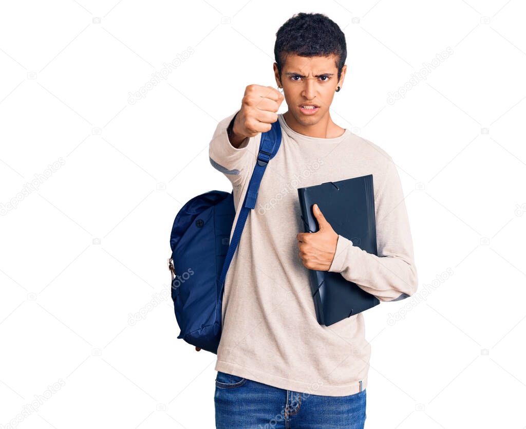 Young african amercian man wearing student backpack holding binder annoyed and frustrated shouting with anger, yelling crazy with anger and hand raised 