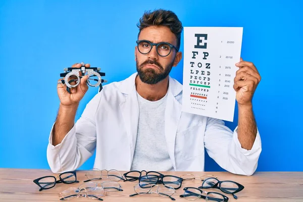 Young Hispanic Man Optometry Glasses Paper Letters Depressed Worry Distress — Zdjęcie stockowe