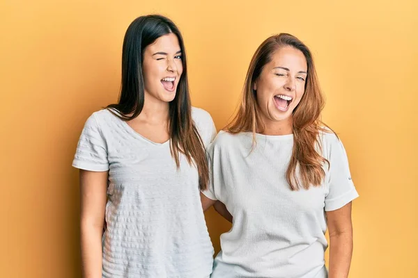 Hispanic Family Mother Daughter Wearing Casual White Tshirt Winking Looking — Foto Stock