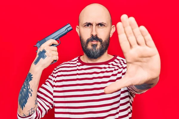 Young Handsome Man Holding Gun Open Hand Doing Stop Sign — 스톡 사진