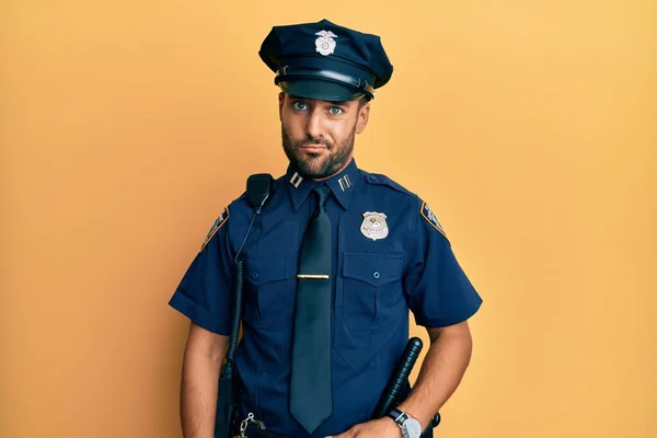 Handsome Hispanic Man Wearing Police Uniform Skeptic Nervous Frowning Upset — Stockfoto