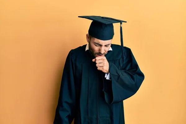 Young Hispanic Man Wearing Graduation Cap Ceremony Robe Feeling Unwell — Stock Photo, Image