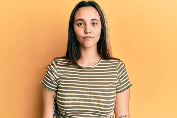 Young Hispanic Woman Wearing Casual Striped Shirt Serious Expression Face — Stock Photo, Image