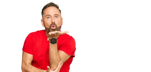 Handsome Middle Age Man Wearing Casual Red Tshirt Looking Camera — Stock Photo, Image