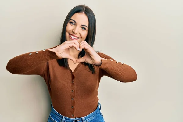 Young Brunette Woman Wearing Casual Clothes Smiling Love Doing Heart — Stock Photo, Image