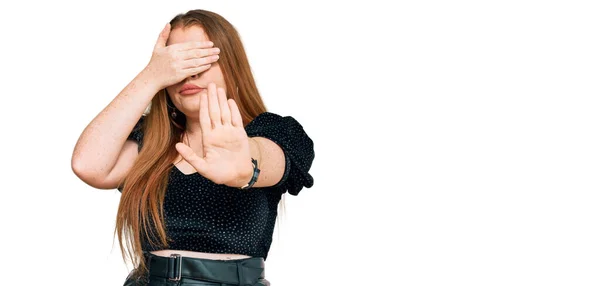 Young Beautiful Redhead Woman Wearing Elegant Clothes Covering Eyes Hands — Stock Photo, Image