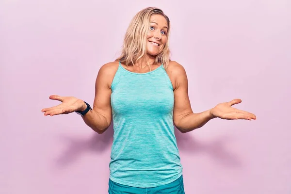 Middle Age Caucasian Blonde Woman Wearing Sports Clothes Pink Background — Stock Photo, Image