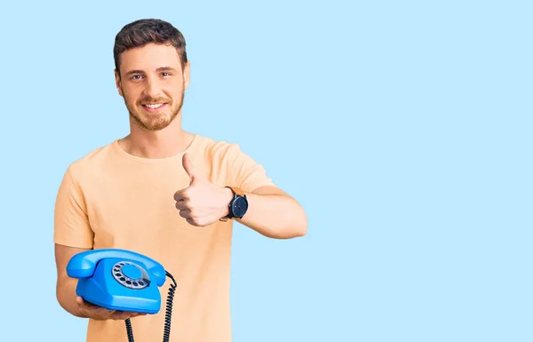 Handsome Young Man Bear Holding Vintage Telephone Smiling Happy Positive — Stock Photo, Image