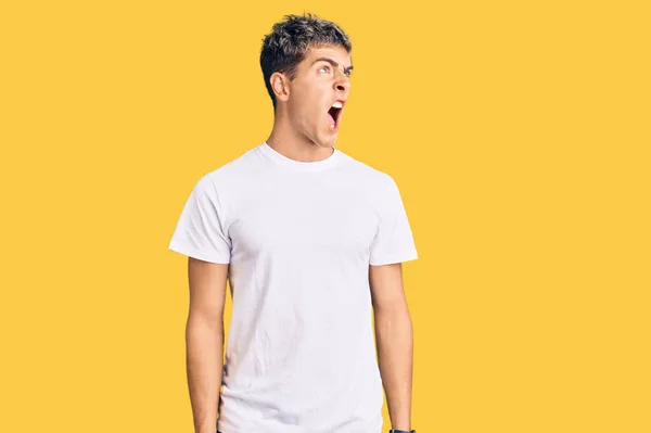 Young Handsome Man Wearing Casual White Tshirt Angry Mad Screaming — Stock Photo, Image