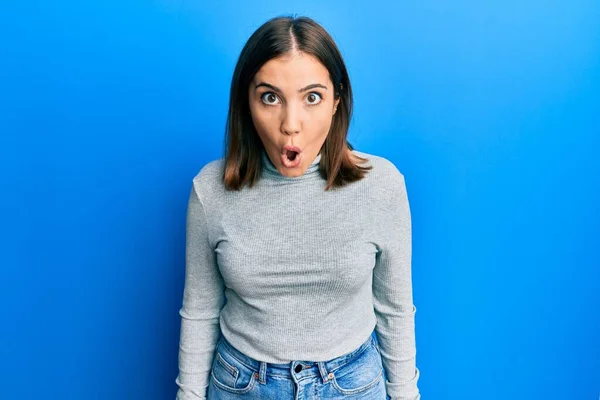 Young Beautiful Woman Wearing Casual Turtleneck Sweater Scared Amazed Open — Stock Photo, Image