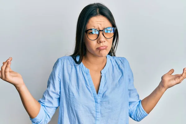 Young Hispanic Girl Wearing Casual Clothes Glasses Clueless Confused Open — Stock Photo, Image