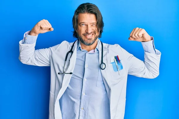 Middle Age Handsome Man Wearing Doctor Uniform Stethoscope Showing Arms — Stock Photo, Image