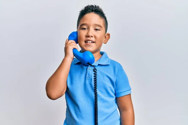 Menino Hispânico Criança Falando Através Telefone Vintage Olhando Positivo Feliz — Fotografia de Stock