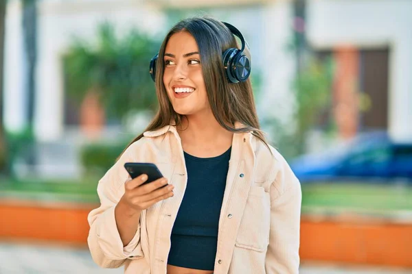 Young Hispanic Girl Smiling Happy Using Smartphone Headphones Park — Stock Photo, Image