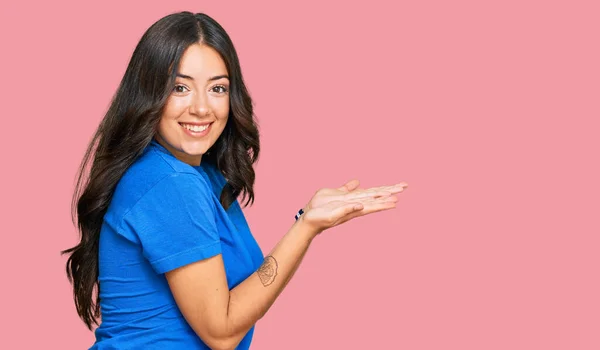 Beautiful Brunette Young Woman Wearing Casual Clothes Pointing Aside Hands — Stock Photo, Image