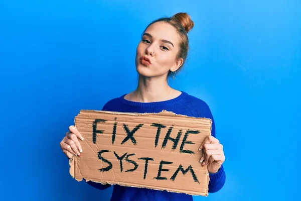 Young Blonde Woman Holding Fix System Banner Cardboard Looking Camera — Stock Photo, Image