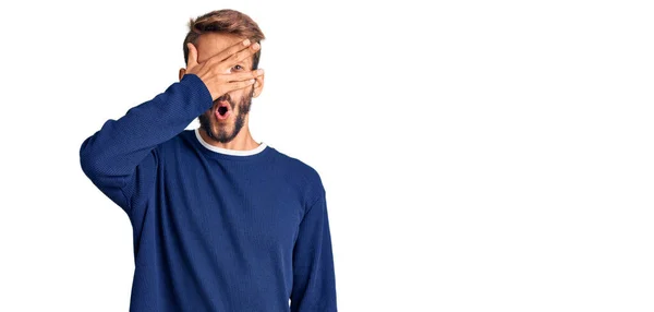 Handsome Blond Man Beard Wearing Casual Sweater Peeking Shock Covering — Stock Photo, Image