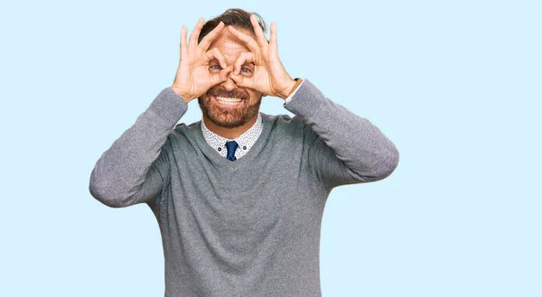 Handsome Middle Age Man Wearing Business Clothes Doing Gesture Binoculars — Stock Photo, Image