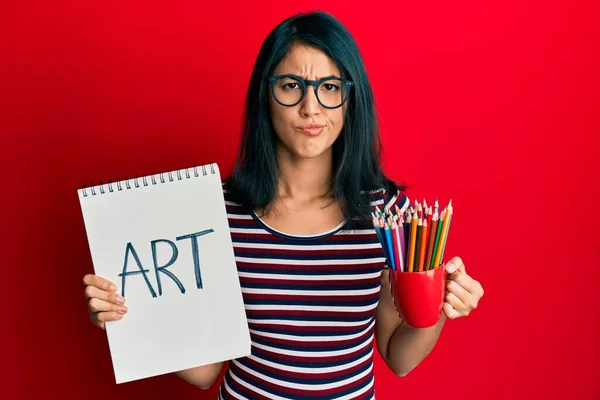 Beautiful Asian Young Woman Holding Art Notebook Colored Pencils Skeptic — Stock Photo, Image