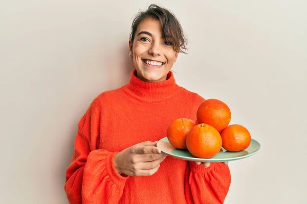 Young Hispanic Woman Holding Fresh Oranges Looking Positive Happy Standing — Stock Photo, Image