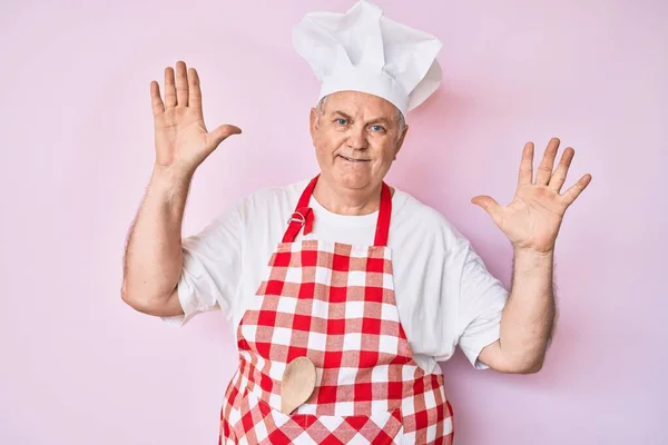 Senior Grey Haired Man Wearing Professional Baker Apron Showing Pointing — Stock Photo, Image