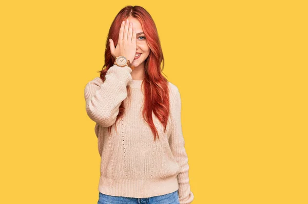 Young Redhead Woman Wearing Casual Winter Sweater Covering One Eye — Stock Photo, Image