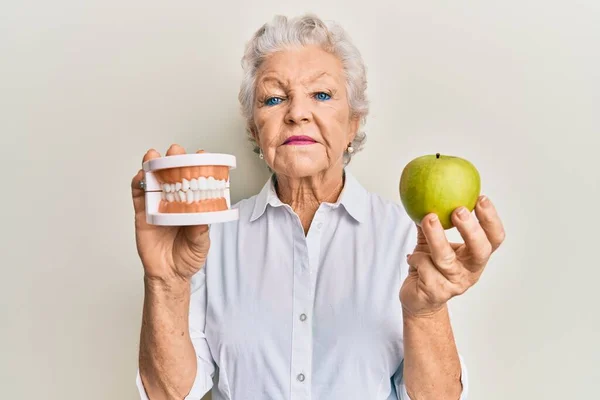 Senior Grey Haired Woman Holding Green Apple Denture Teeth Relaxed — Stock Photo, Image