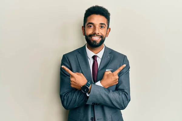 Handsome Hispanic Man Beard Wearing Business Suit Tie Pointing Both — Stock Photo, Image