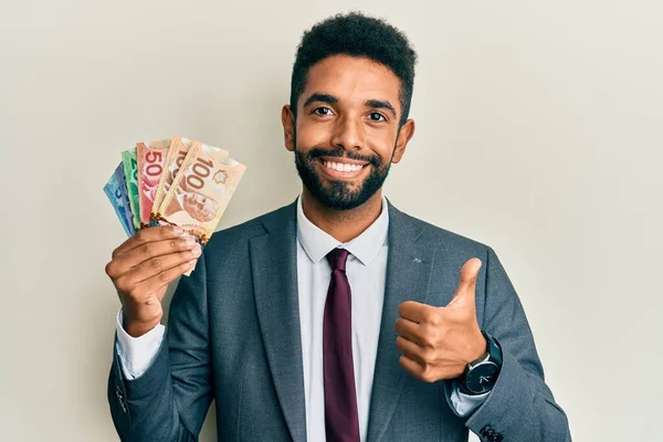 Handsome Hispanic Business Man Beard Holding Canadian Dollars Smiling Happy — Foto de Stock