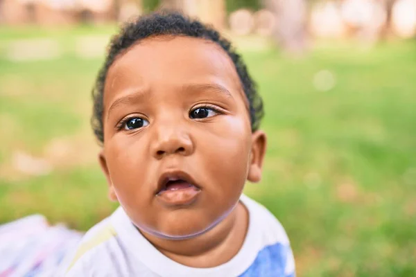 Adorable African American Chubby Toddler Sitting Grass Park — Stock Photo, Image