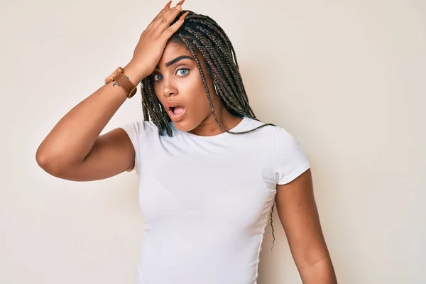 Young African American Woman Braids Wearing Casual White Tshirt Surprised — Stockfoto