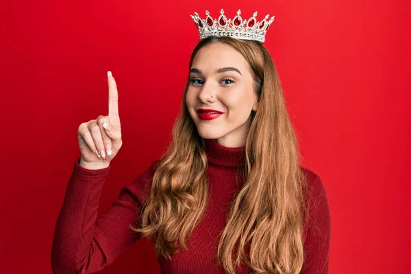 Young Blonde Woman Wearing Princess Crown Smiling Idea Question Pointing — Stock Photo, Image