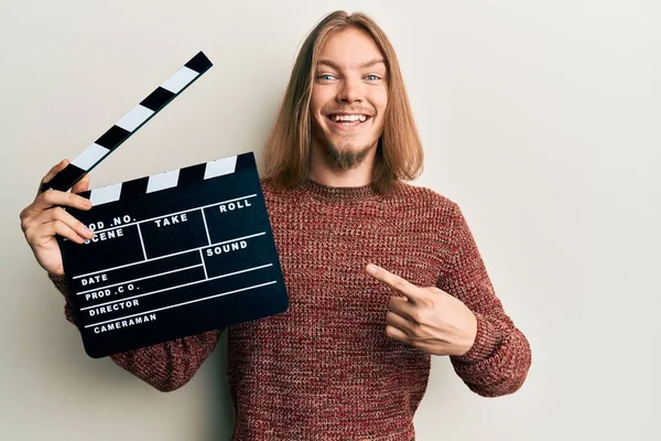 Handsome Caucasian Man Long Hair Holding Video Film Clapboard Smiling — Stock Photo, Image