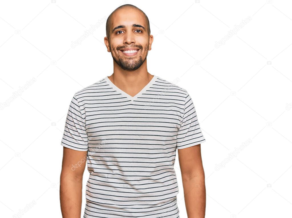 Hispanic adult man wearing casual clothes with a happy and cool smile on face. lucky person. 