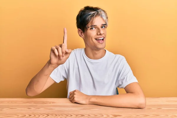 Young Hispanic Man Wearing Casual Clothes Sitting Table Smiling Idea — Stock Photo, Image