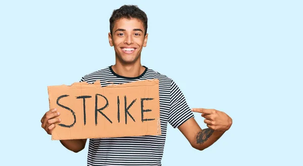 Young Handsome African American Man Holding Strike Banner Cardboard Smiling — Stock Photo, Image