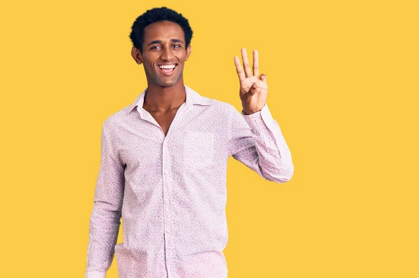 African Handsome Man Wearing Casual Pink Shirt Showing Pointing Fingers — Stock Photo, Image