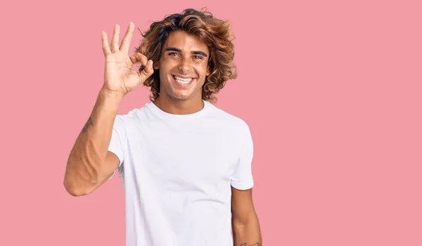 Young Hispanic Man Wearing Casual White Tshirt Smiling Positive Doing — Stock Photo, Image